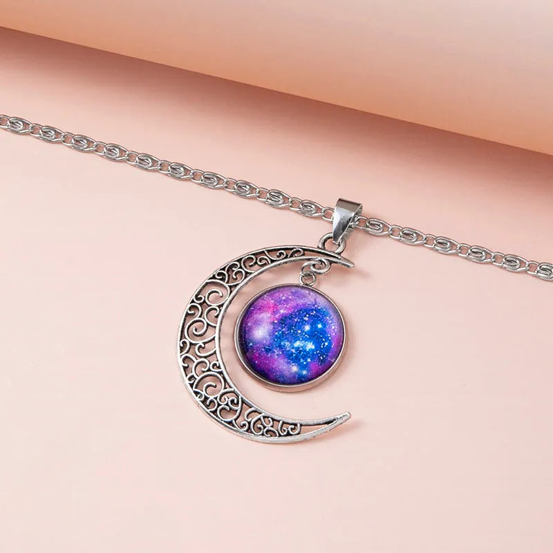 Silver hollow moon pendant necklace with glass star insert on Figaro chain for women