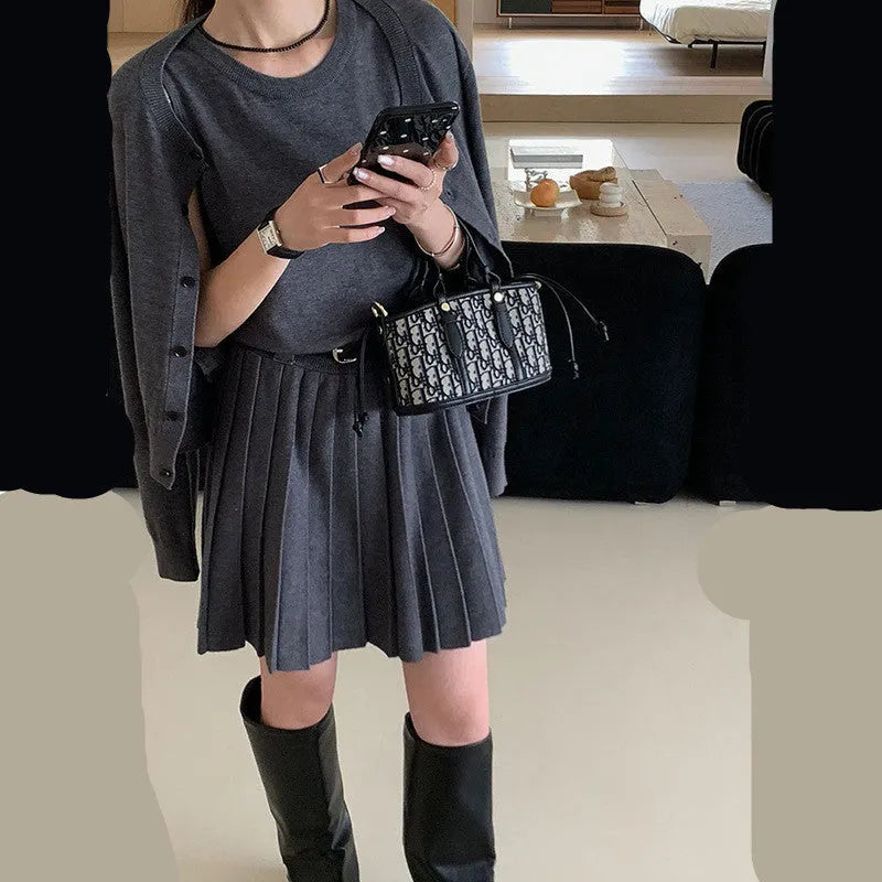 Women's grey knitted vest skirt and cardigan two-piece set with 3D pattern
