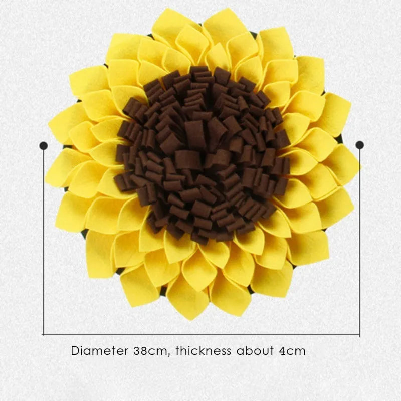 Yellow sunflower-shaped dog snuffle mat with fleece texture and a hanging rope buckle.