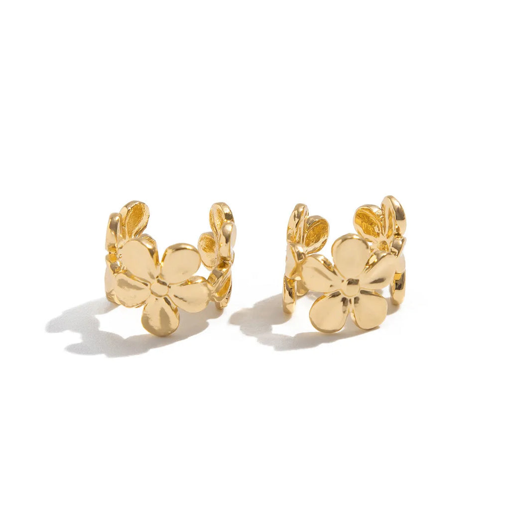 Gold electroplated starfish and conch shell drop earrings with beach style design