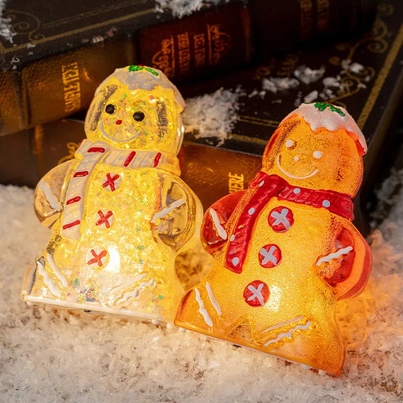 Glowing plastic gingerbread man Christmas ornament with a scarf in one of four colour options.