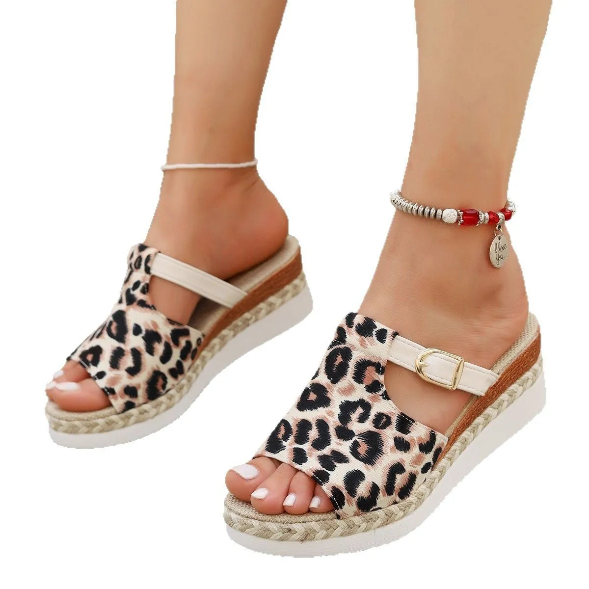 Leopard print women's platform sandals with a wedge heel and fish mouth toe in beige, on a white background.