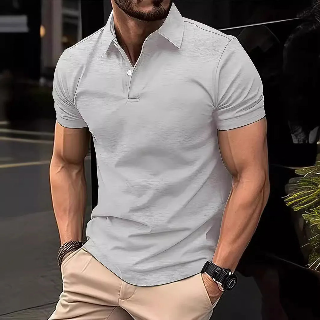 Men's slim fit button-front short sleeve casual shirt in a solid colour on a hanger.