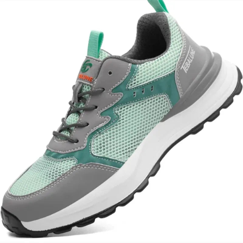 Green low-top safety work shoes with plastic toe cap and breathable mesh upper.
