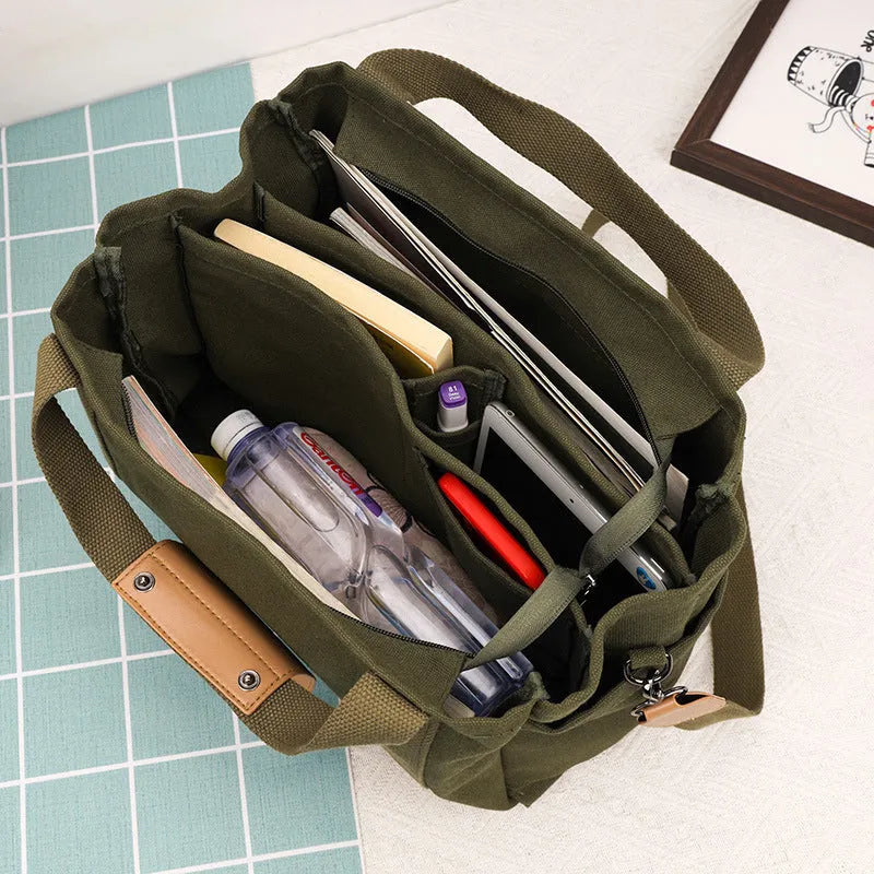 Large capacity canvas tote bag with internal organisers and side zippers in Army Green colour
