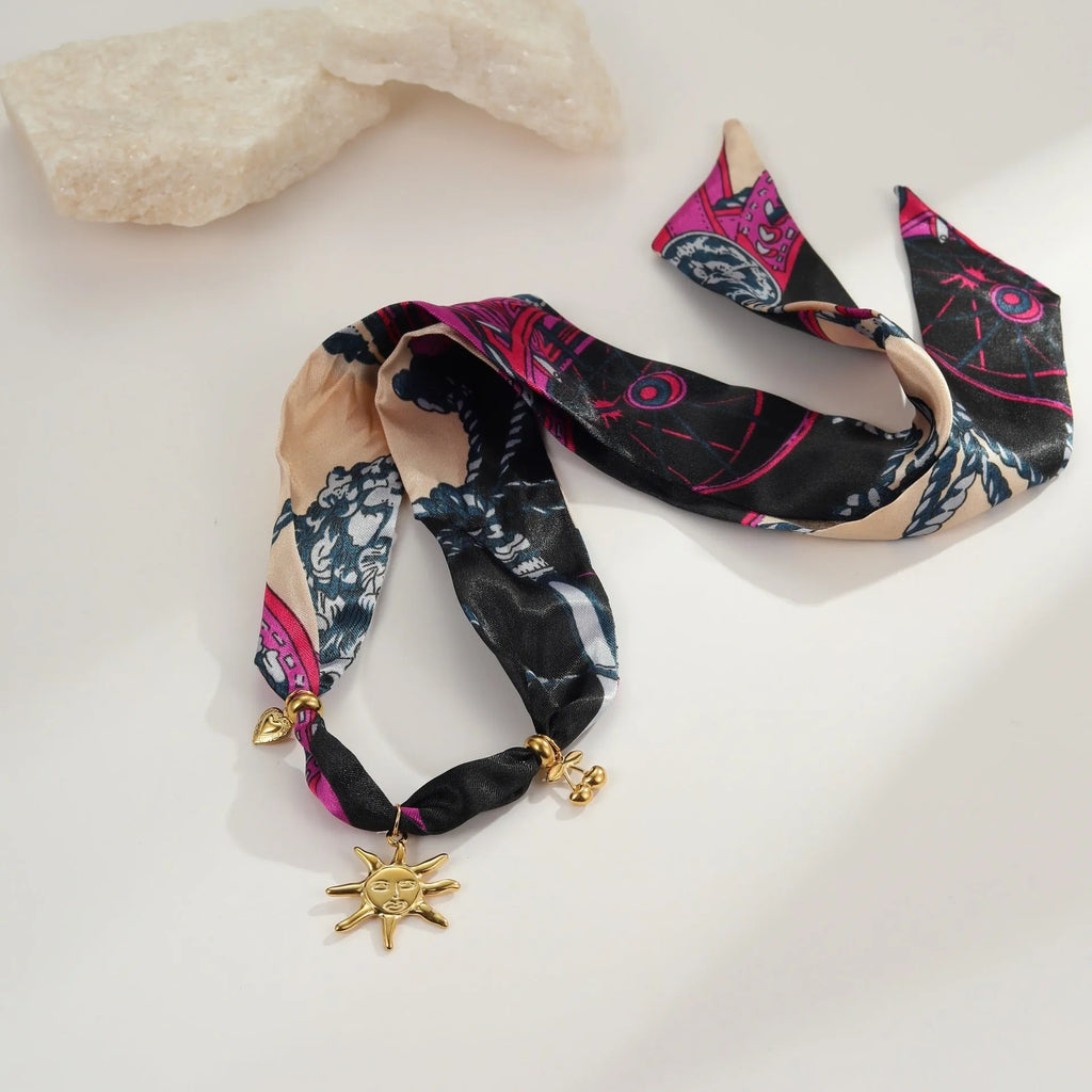 Stainless steel sun pendant necklace and bracelet set with 18K gold electroplating and geometric design