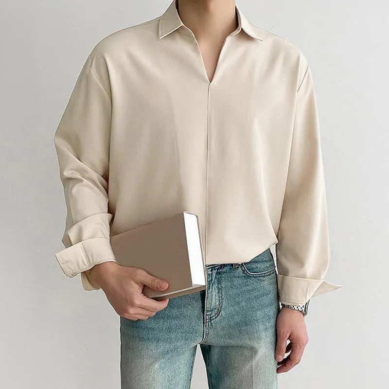 Loose lapel casual pullover shirt in solid colour on a hanger.