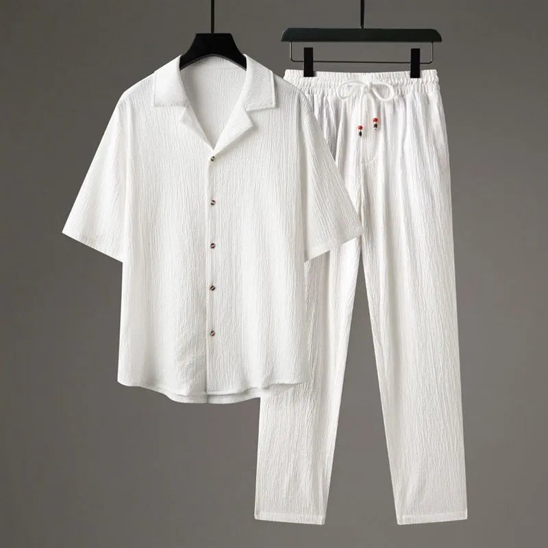 Men's national style two-piece sportswear set showing knitted half-sleeve top and full-length trousers