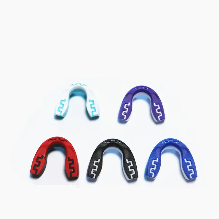 Adult boxing mouthguard with printed teeth design in black/white, red/white, and blue/white colour options