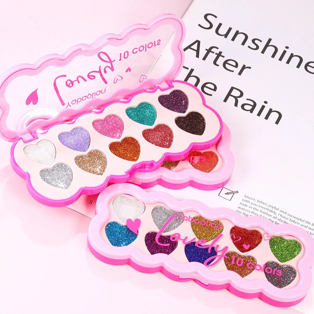 Heart-shaped ten-colour eye shadow palette with pearlescent sequin finishes in white, beige, pink, purple, brown, blue, black, royal blue, maroon, and coral.