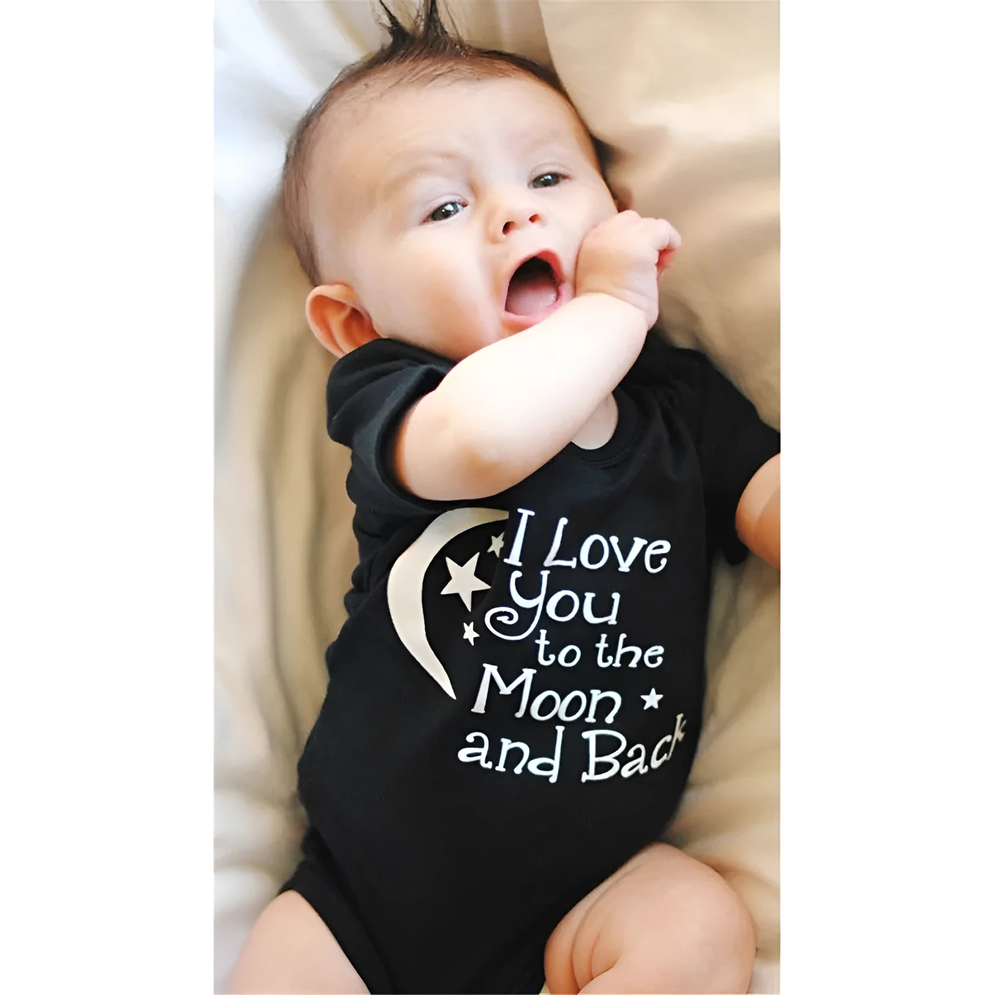 Black polyester baby romper with moon and star letter print, short sleeves, triangle climbing style, front view
