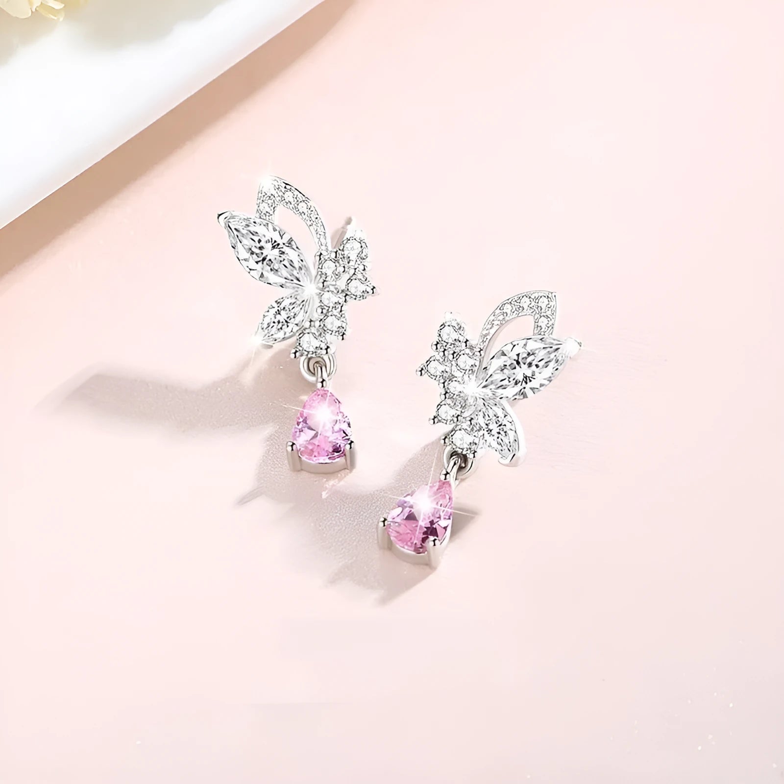Silver butterfly stud earrings with crystal details on 925 sterling silver