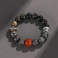 Gold obsidian flame stone red agate Wukong unisex bracelet on display showing natural stone beads