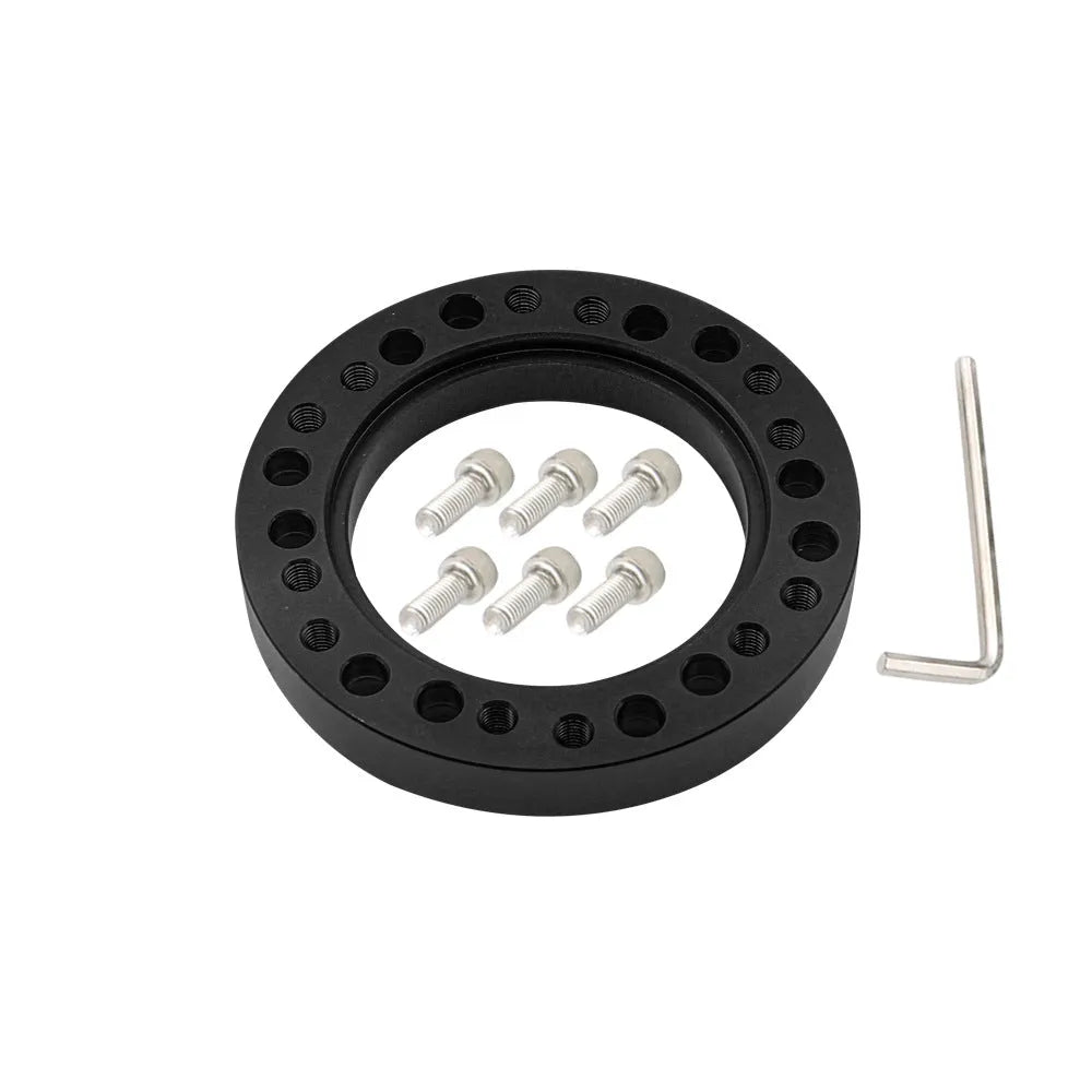 Steering wheel hub adapter in aluminium alloy with 86mm outer diameter, 55mm inner diameter, 12.5mm height, on white background