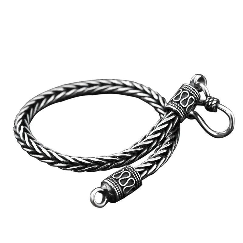 Vintage braided keel bracelet for men in 925 silver with wave design and retro finish, photo colour