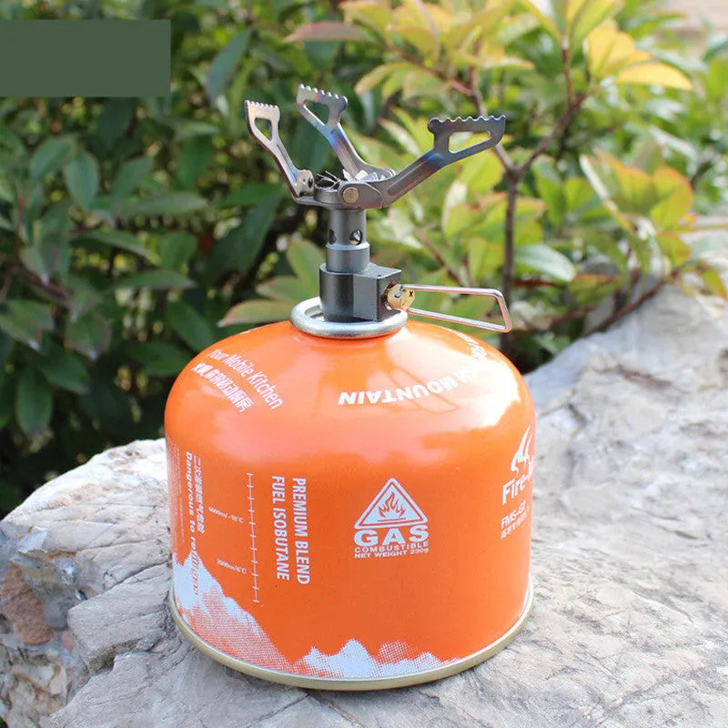Silver titanium mini camping gas stove with rotary flame, 25g weight, portable for outdoor use