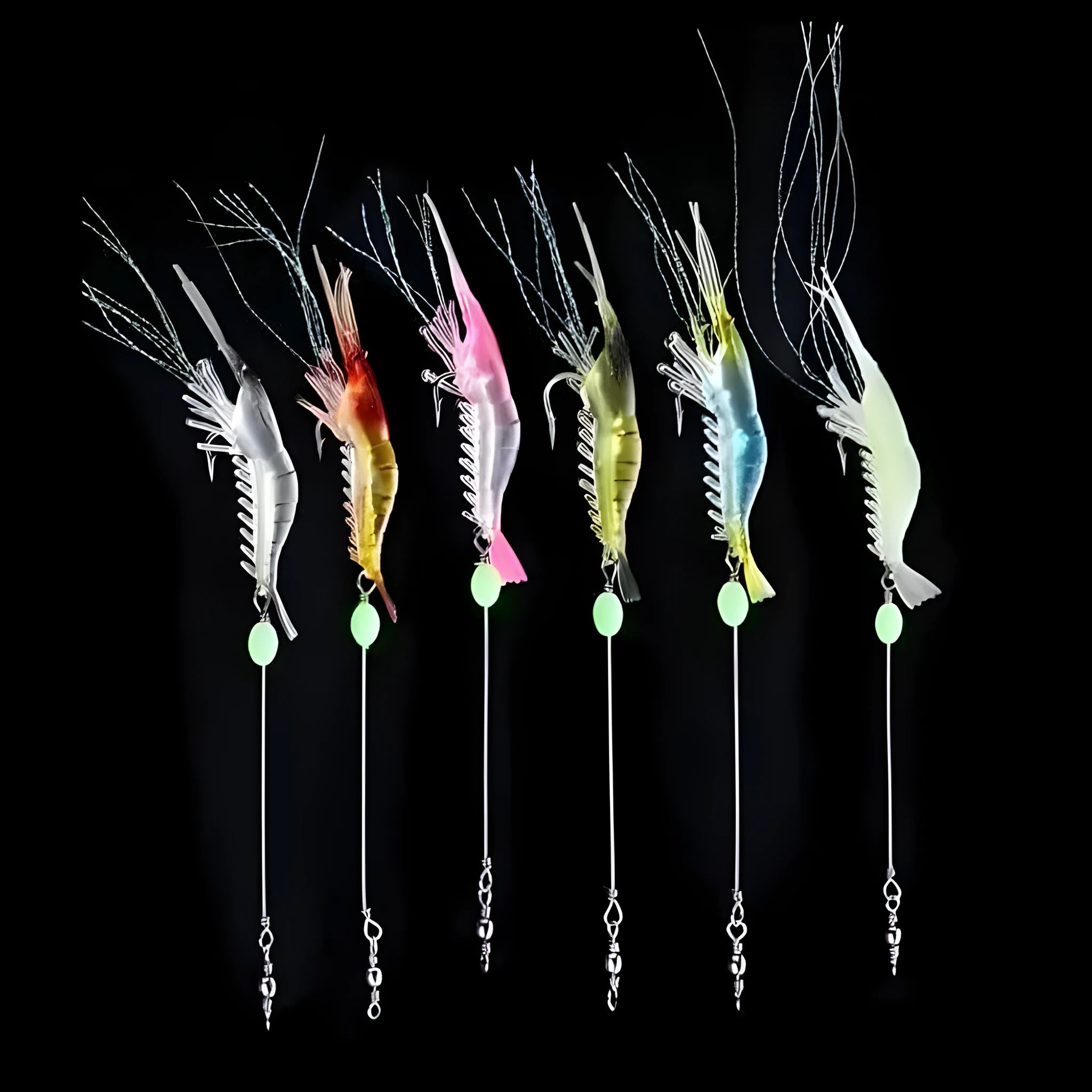 Luer soft fishing lure with metal hook in assorted colours including luminous pink and black head yellow body.