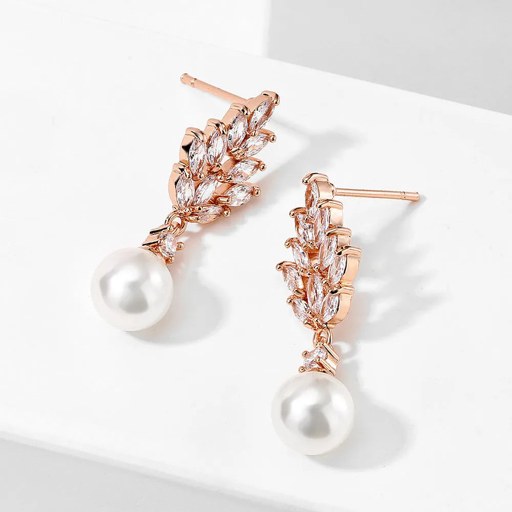 Geometric flower design earrings with micro inlaid zircon decoration in gold, platinum, and rose gold finishes