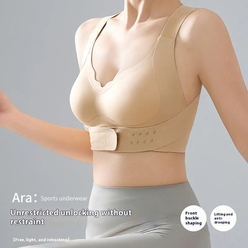 Women's cross design exercise bra with front buckle closure and back shaping in nylon fabric