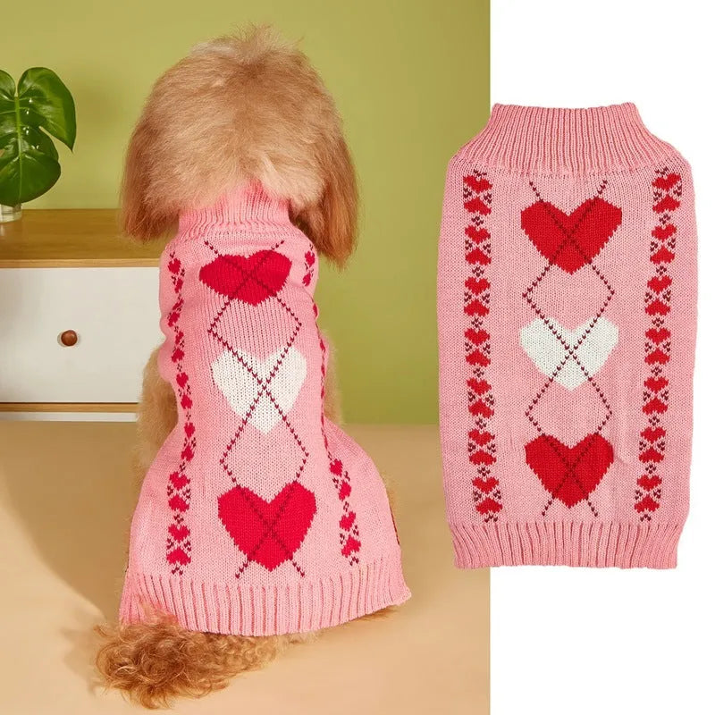 Dog wearing red love heart patterned sweater in acrylic knit fabric