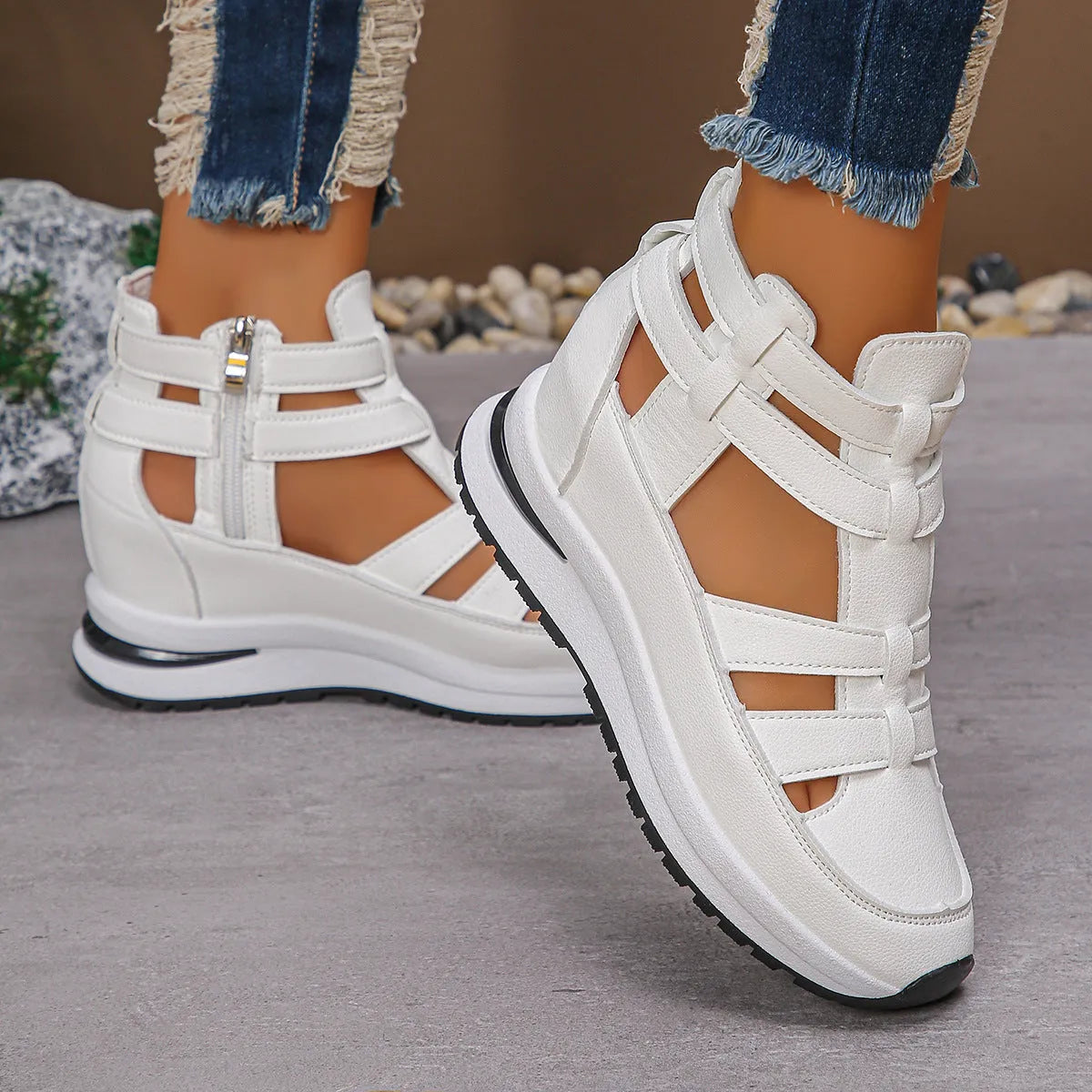 Women's black close-toed hollow-out platform sandals with Velcro fastening showing round toe design