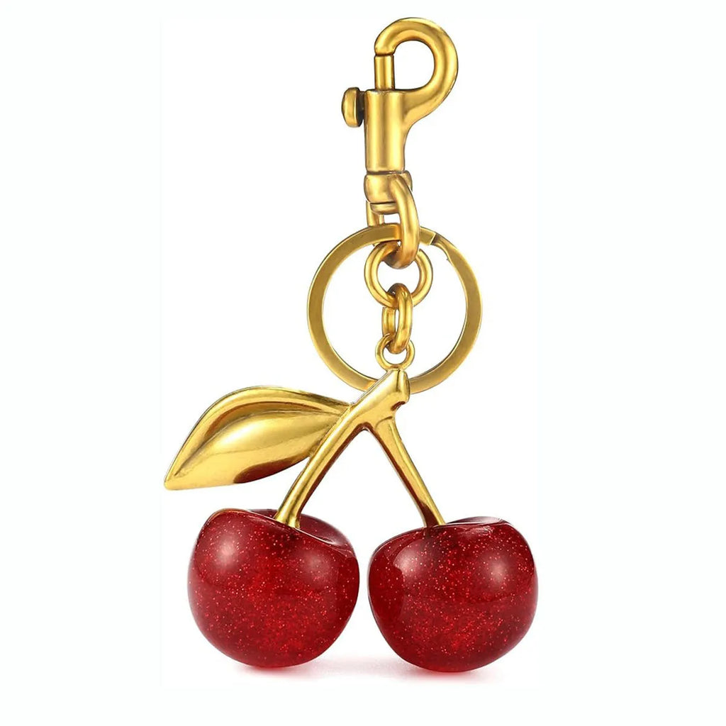Red or pink zinc alloy cherry pendant keychain for car keys and bags.