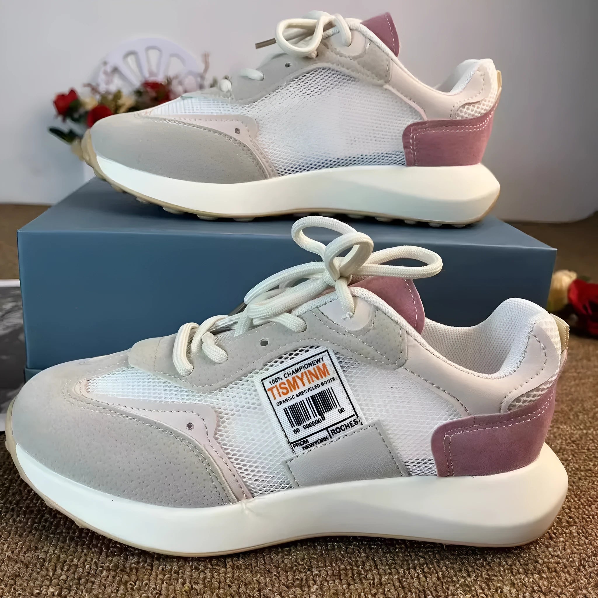 Women's grey and pink retro sneakers with mesh lining and rubber soles, low-top design