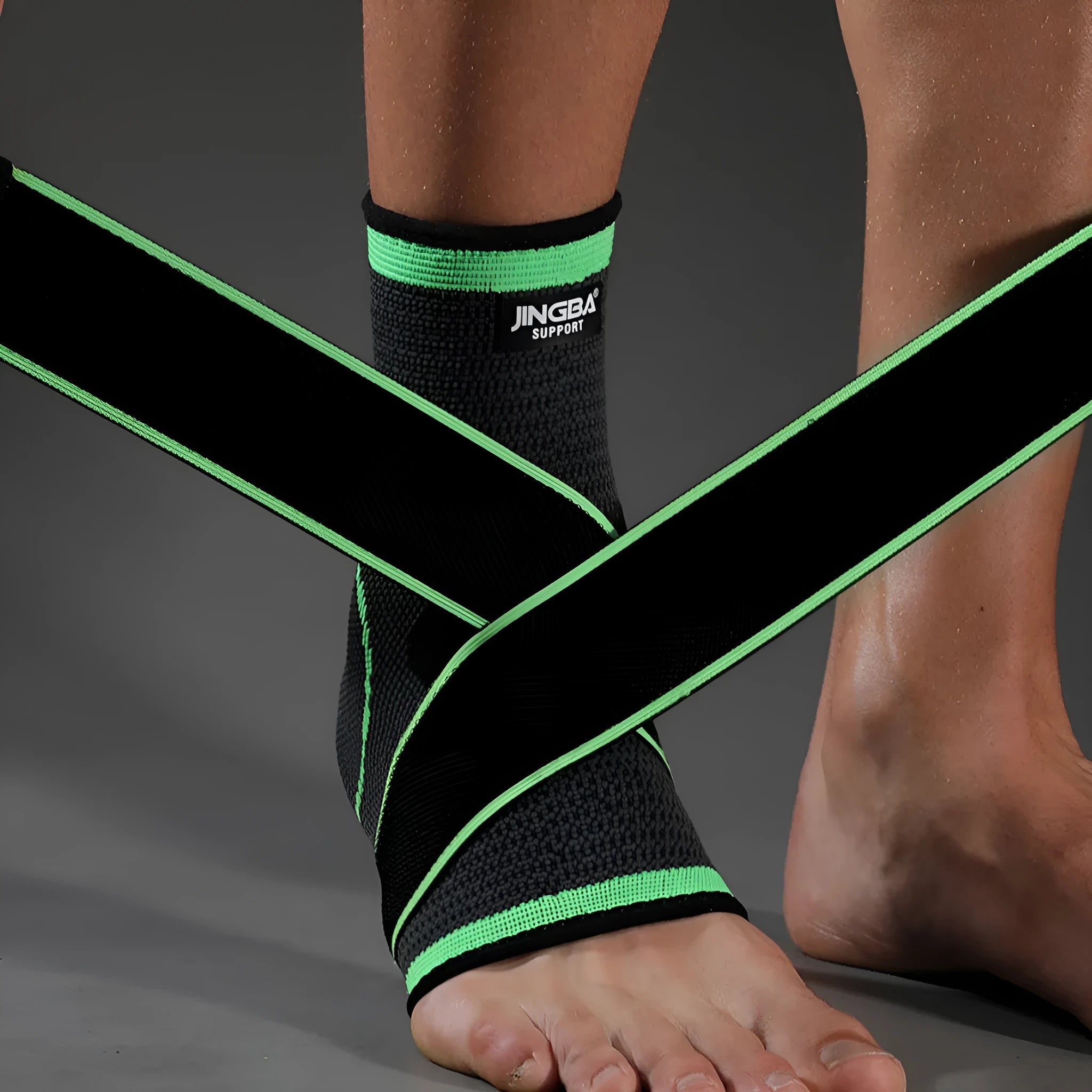 Adult sports ankle support in black colour shown, suitable for basketball and running.
