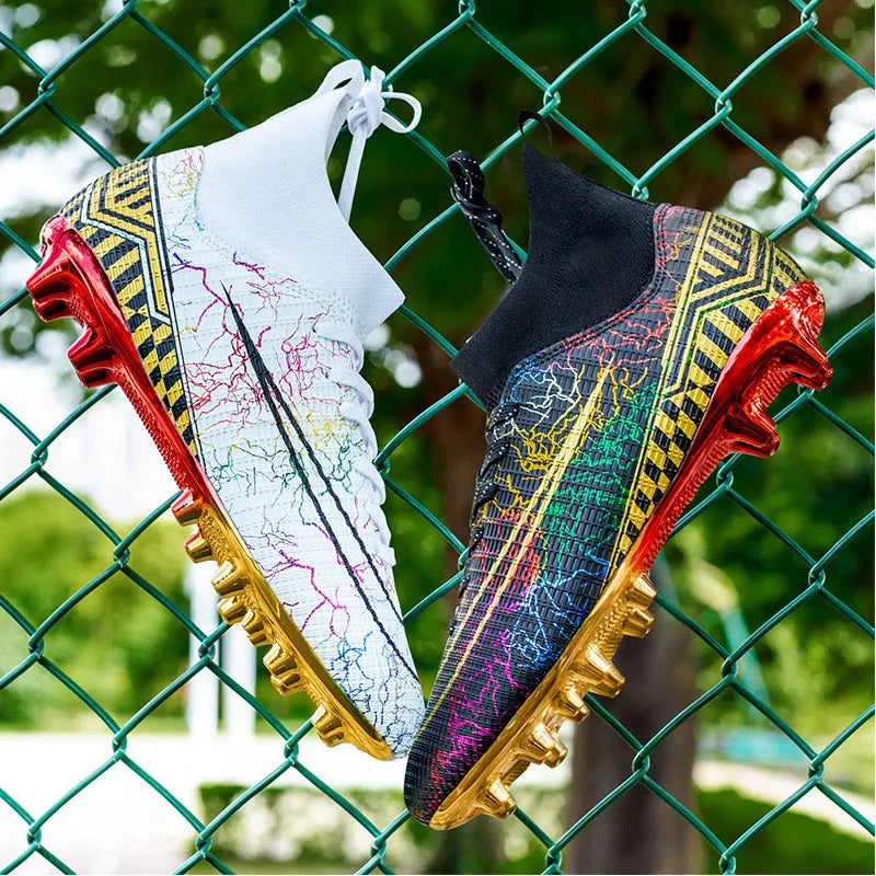 Men's high-top football training shoes with a gold-plated sole on an artificial grass surface
