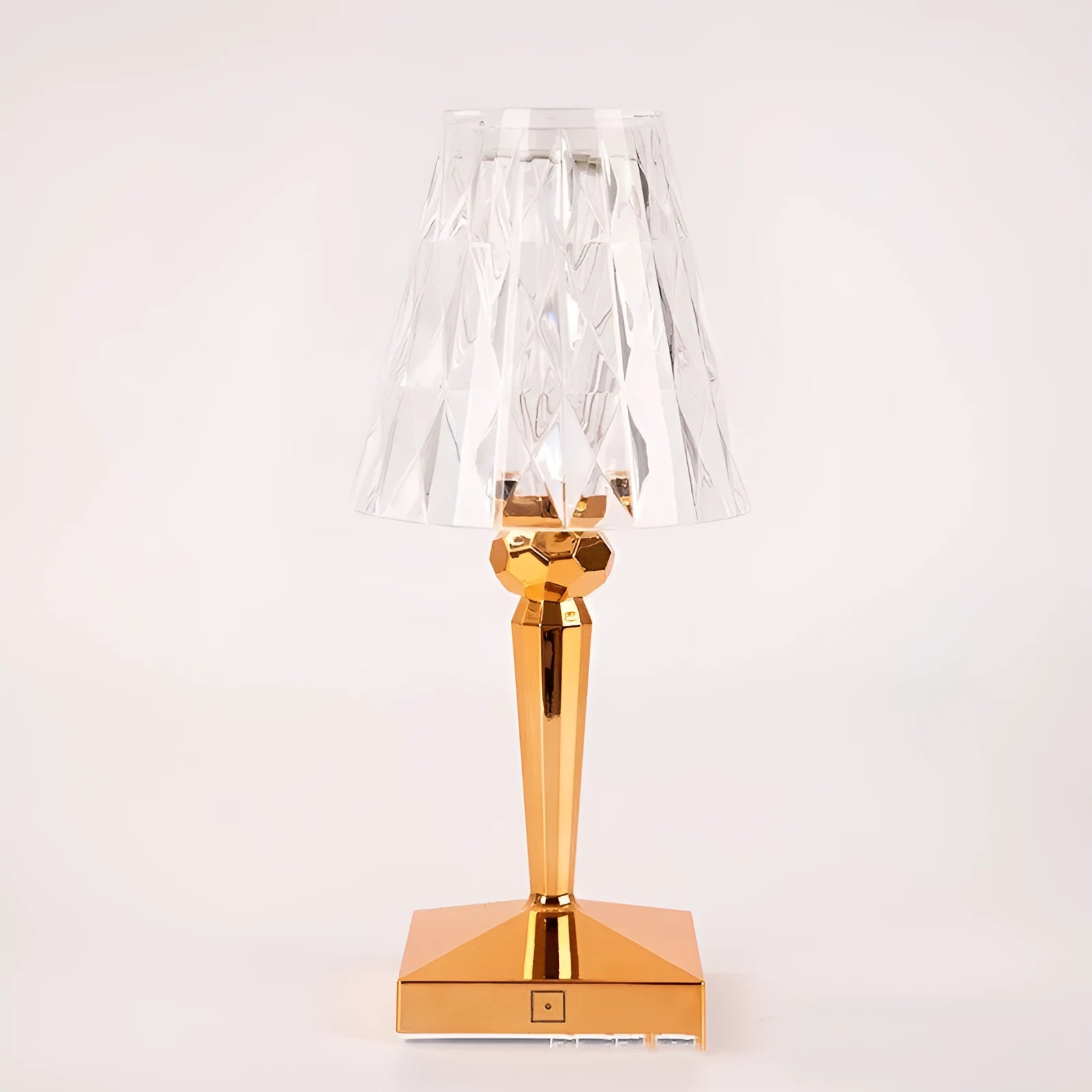 Portable rose gold touch projection night light with rechargeable battery on display