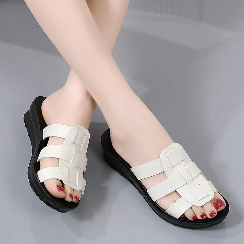 Women's large size soft sole slippers in beige, black and brown colours with flat bottom design