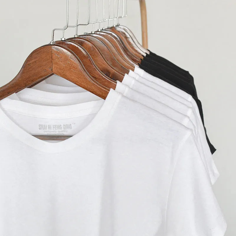 Men's solid colour round neck t-shirt in combed cotton fabric shown in multiple colour options