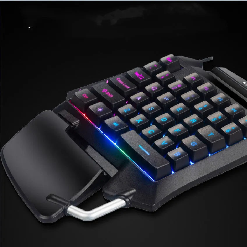 Black one-handed throne converter gaming keyboard with shortcut keys and integrated hand rest for left-hand control