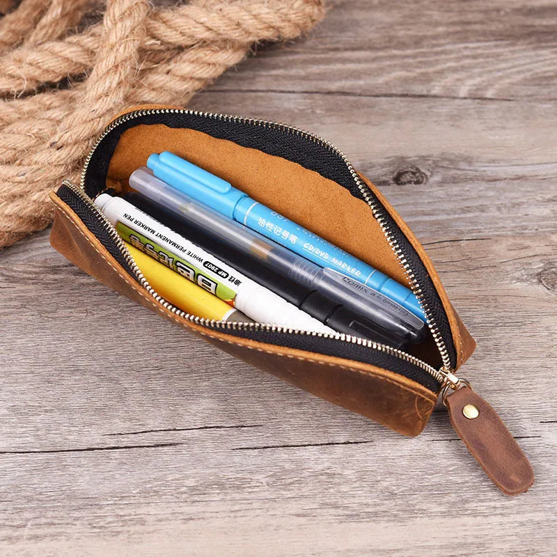 Square cowhide leather pencil case with zip closure measuring 18cm