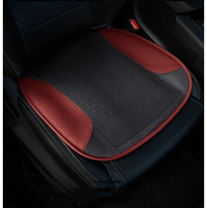 Black USB ventilated car seat cushion with cooling fans on a car seat.