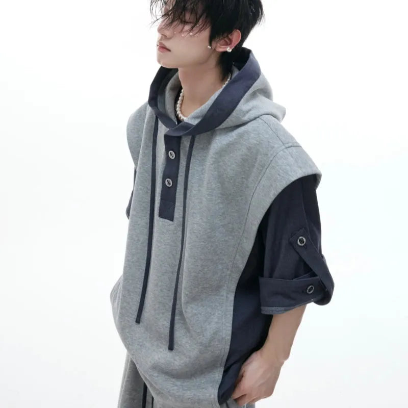 Men's black heavy industry style hooded jacket with three-dimensional stitching and matching grey joggers.