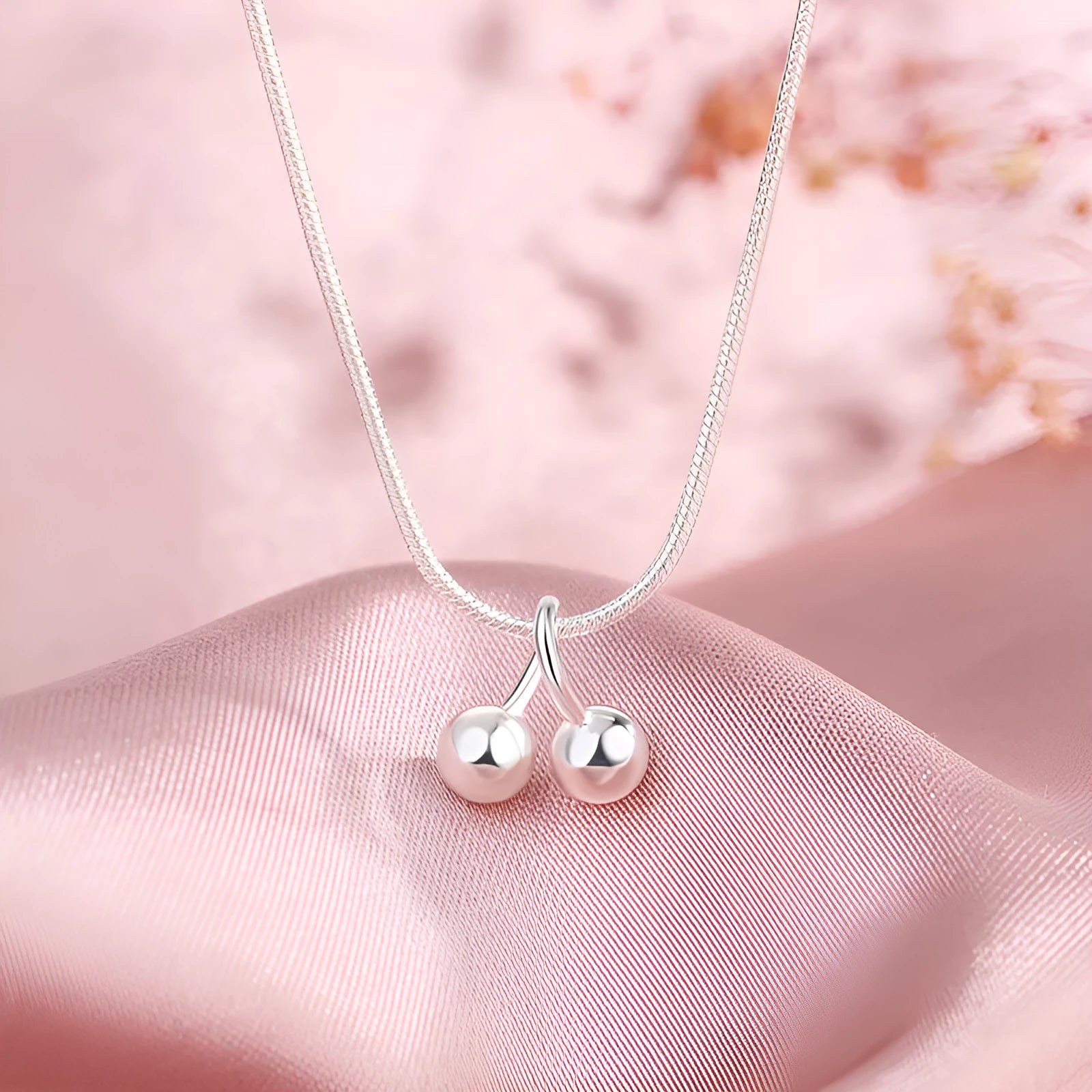 Women's silver cherry necklace with adjustable snake bone chain and fruit pendant
