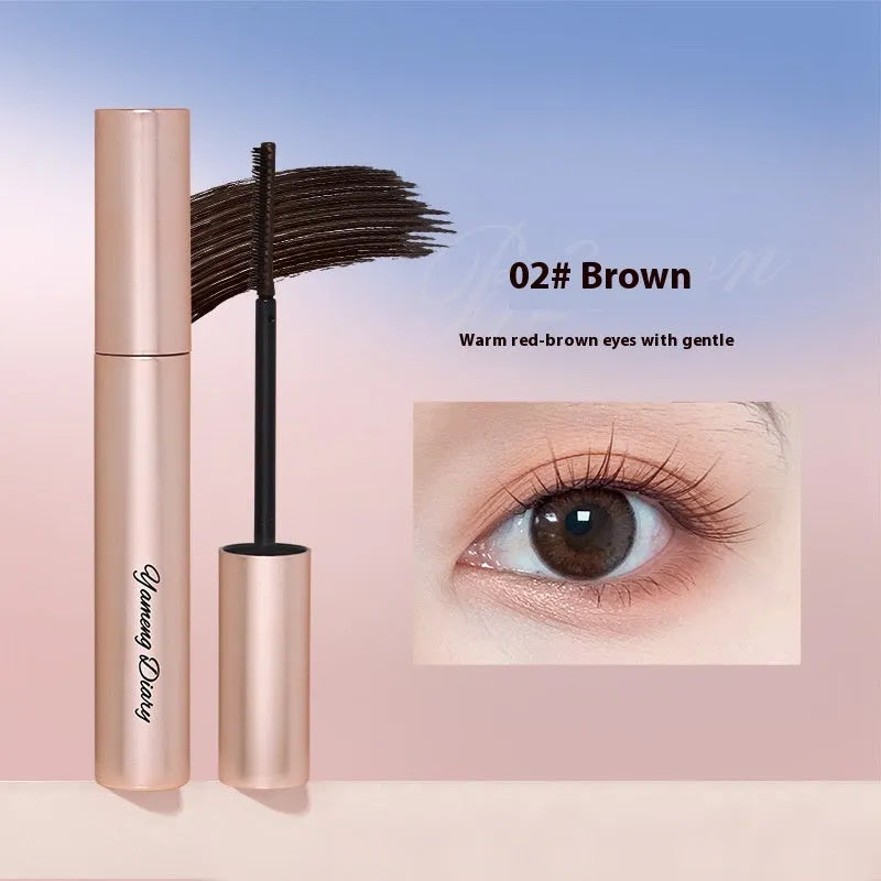 Long Curling Long-lasting Mascara tube in black or brown with applicator brush.
