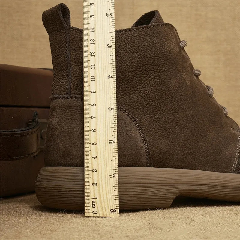 Women's grey genuine leather Martin boots with wedge heel and lace-up front.