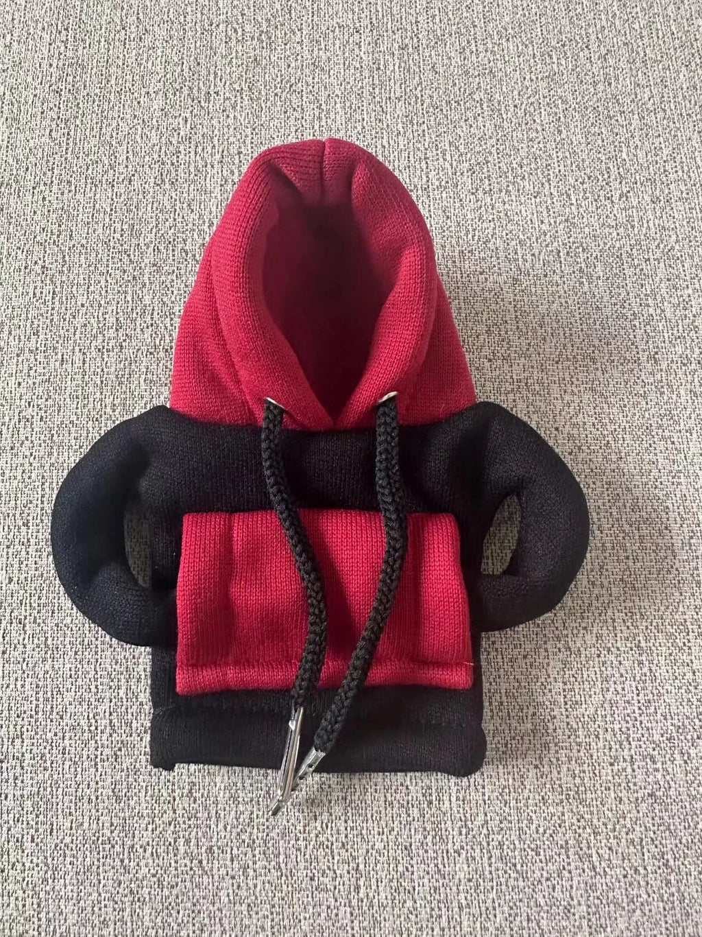 Red and white Christmas-themed polyester hood cover for a car gear shift lever.