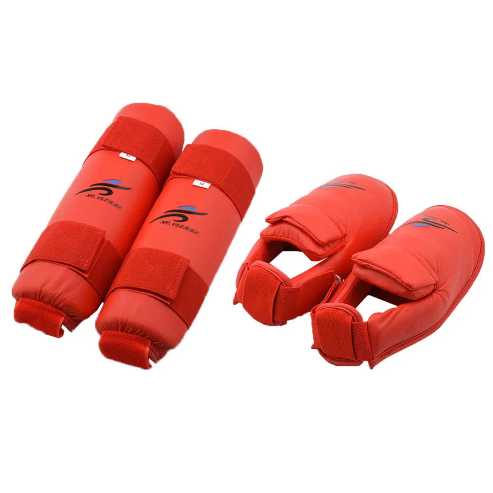 Karate protective gear set showing red leg guards, helmet and boxing gloves for martial arts training