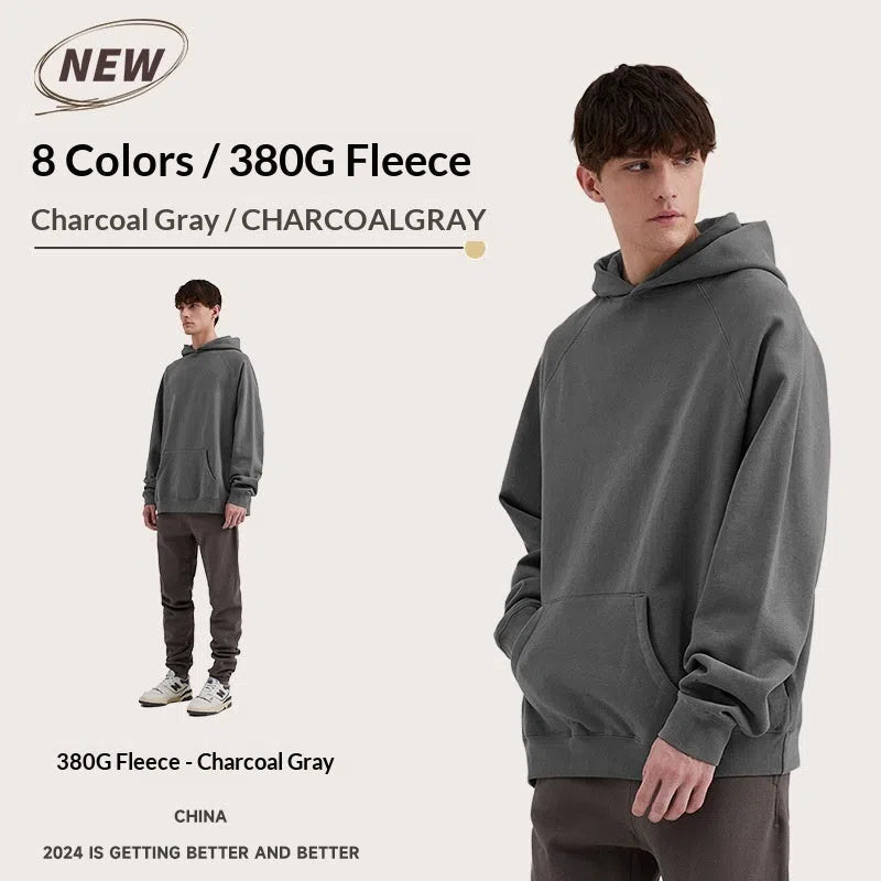 American Vintage heavyweight loose fit cotton hoodie with raglan sleeves and 3D patch pocket in 1977 Black Iron
