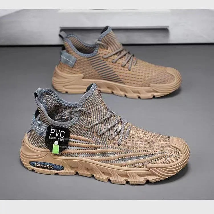 Men's flyknit mesh sneaker in black with thin sole, flat heel, and round toe on a plain background