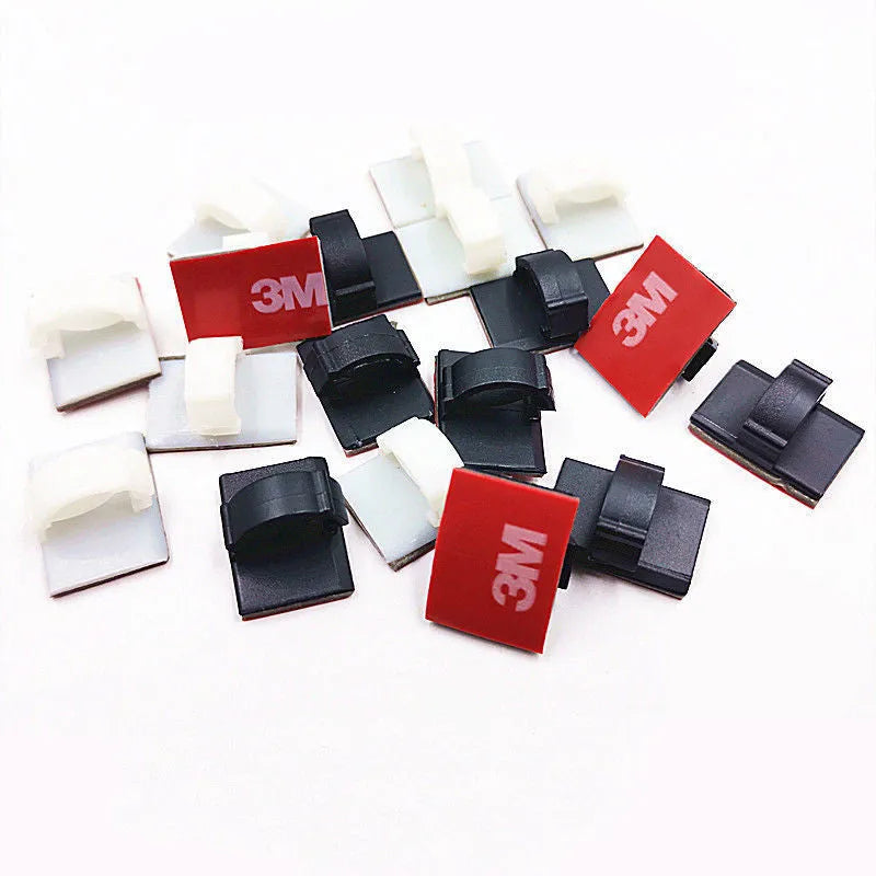 Self-adhesive plastic flat cable wiring buckle for car wire management in black.