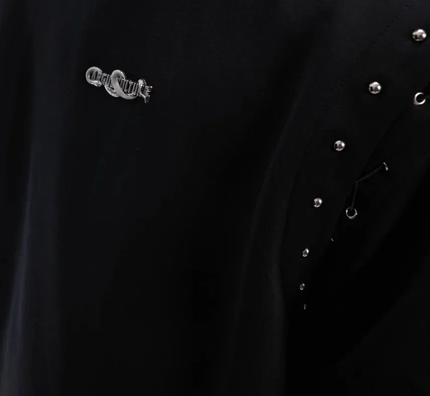Short sleeve black top with a white lace-up cutout detail on the front, deconstruction style.