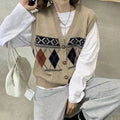 Khaki diamond plaid sleeveless cardigan top laid flat, showing loose fit and sleeveless armholes.