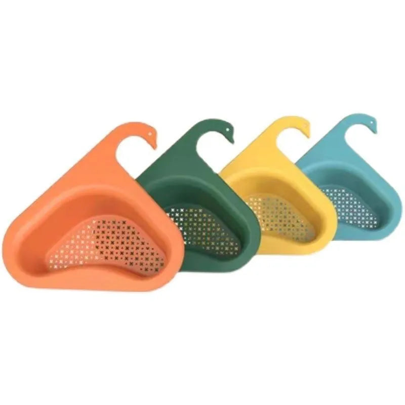 Yellow hanging swan drain basket made of plastic, fitted on a kitchen sink edge with space for vegetables and utensils