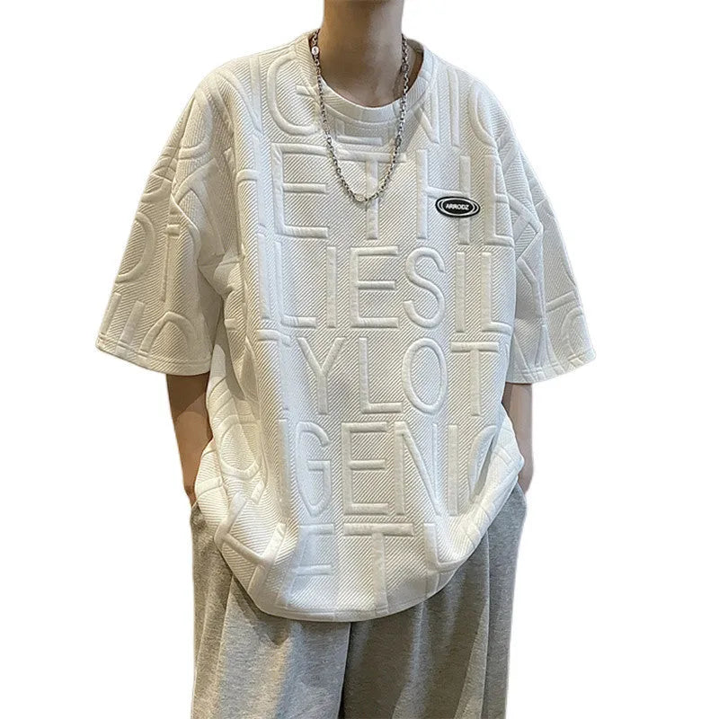Men's black T-shirt with white three-dimensional letter graphics, loose fit, short sleeves