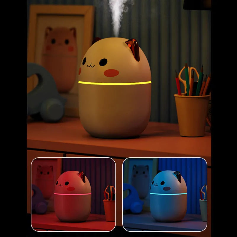 Cute cat-shaped USB air humidifier with LED cool mist spray in white, for office and bedroom use.