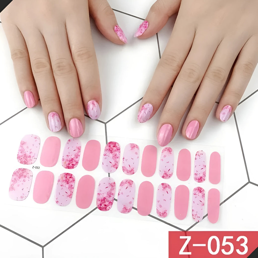Korean Exquisite Nail Stickers pack showing colourful cartoon, floral, and embellished designs with included nail file.